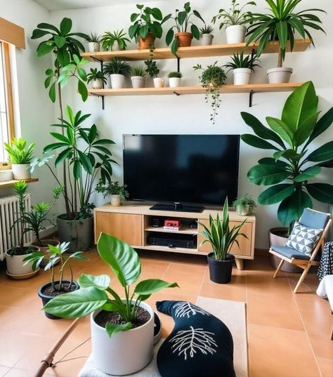 40+ Stylish and Cool TV Wall Decor Ideas Plant Shelf Over Tv, Living Room Tv In Front Of Window, Bohemian Tv Unit, Television Wall Ideas, Shelf Over Tv, Maximalist Living Room Decor, Shelving Lighting, Tv Accent Wall, Wall Panel Texture