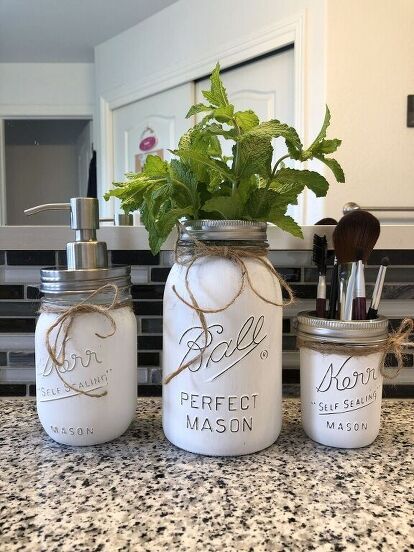 Have you seen those farmhouse mason jars? You can buy them online for $40 or more! I'm going to show you how to paint and distress a mason or recycled jar to look rustic for a fraction of the cost! You can see more of my crazy creations here Pick Your Jar Size For this project I'm going to create 5 farmhouse mason jars. I picked a variety of sizes for what I'll be using them for. You can also use recycled jars as well. Remove the center lid I took the center part out of each of the m… Upcycle Jars, Cotton Ball Holder, Distressed Mason Jars, Recycled Jars, Farmhouse Paint, Decor Hacks, Mason Jar Crafts Diy, Jar Diy, Painted Mason Jars