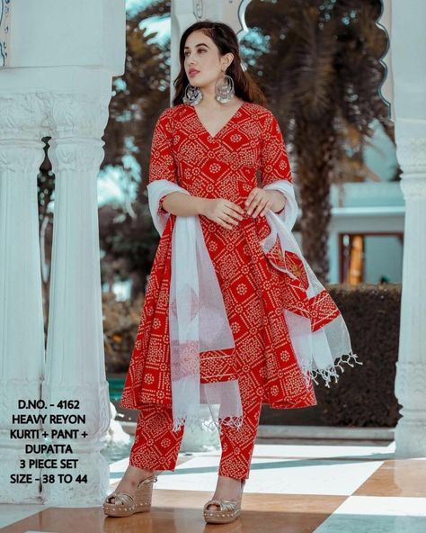 😃 RESTOCK 👗  Beautiful Heavy Rayon Bandhej Printed Kurti With Pant And Beautiful Malmal Dupatta 👗  ⭐ D.NO. -  4162  ⭐Fabric:  14 Kg Rayon  ⭐Available Size: M/38, L/40, XL/42, XXL/44   ⭐ Product: Kurti + Pant + Dupatta cotton  🤩Single Piece Price: 950/- Free Shipping🤩 Dress Neck Pattern, Bandhani Suit, Kurti Ideas, Bandhani Print, Breezy Outfit, Bandhani Dress, Stylish Kurtis Design, Simple Kurta Designs, Dress Neck