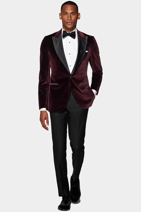 Men's black tie attire with a twist. Dinner jacket switched for a burgundy velvet jacket. This outfit first appeared in the article: How A Man Should Dress For A Wedding: From Groom To Guest, on MensFlair.com Mens Black Tie Attire, Wedding Guest Men, Party Dress Outfit, Creative Black Tie, Velvet Dinner Jacket, Dress Outfits Party, Black Tie Optional, Black Tie Attire, Burgundy Tuxedo