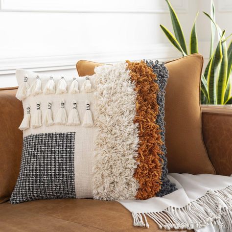 Boho style is one of the most fun to decorate for. It’s all about bringing texture, pattern, and color to a room. And since there are so many takes on... | Neutral Bohemian Throw Pillow that Offers Big Impact Black And White Throw Pillows, Beige Pillow Covers, Boho Throws, White Throw, Boho Throw Pillows, Beige Pillows, Woven Pillows, White Throw Pillows, Stripe Throw Pillow