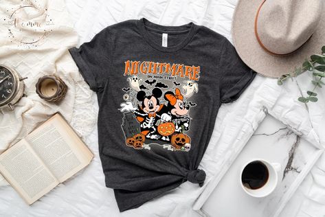 This Gender-Neutral Adult T-shirts item is sold by TheMMCBoutique. Ships from United States. Listed on Sep 10, 2023 Vintage Disney Halloween, Disney World Shirts, Shirts Vintage, Halloween Shirts, Disney Halloween, Halloween T Shirt, Disney Shirts, Mickey Minnie, Branded Shirts