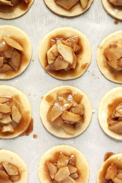 Sweet ginger-spiced pear hand pies, flaky pastry and caramelized pear filling packed with favorite fall flavors - ginger, cinnamon, cloves, and vanilla - everything to love about traditional pie, in deliciously convenient hand-held form. Find the recipe on forkknifeswoon.com #pear #handpie #pie #ginger #turnover #pastry #fallbaking #dessert Pear Hand Pies, Pear Filling, Pear Desserts, Caramelized Pear, Ginger Pear, Pear Pie, Pear Dessert, Buttery Pie Crust, Apple Hand Pies