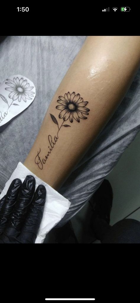 Daisy Tattoo With Name In Stem, Sunflower Tattoo Design For Women, Sunflower Name Tattoo, Side Calf Tattoos For Women, Sunflower Tattoo Simple, Daisy Tattoo Designs, Rose Tattoos For Women, Remembrance Tattoos, Flower Wrist Tattoos