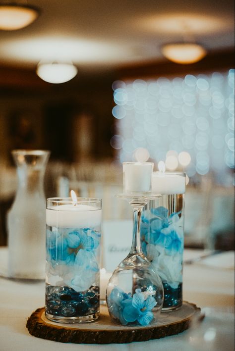 Blue And White Candle Centerpieces, Ice Blue Wedding Centerpieces, Blue Glass Wedding Decor, Candle Mirror Centerpiece, Margarita Centerpiece, Floating Candle Flower Centerpieces, Blue Candle Centerpieces, Avatar Wedding, White Candles Centerpiece