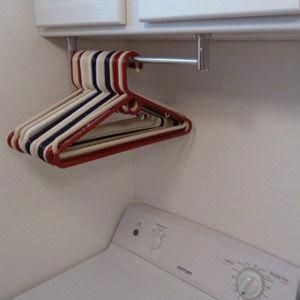 Clothes Hanger Storage, Holding Paper, Laundry Room Storage Shelves, Room Storage Diy, Crazy House, Hanger Storage, Laundry Closet, Small Laundry Room, Small Laundry