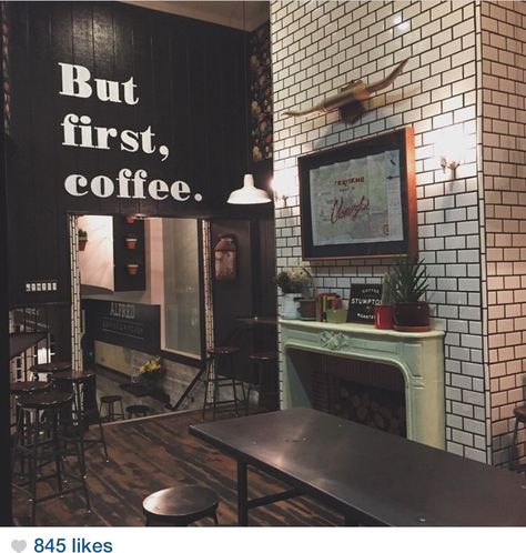 Decor coffee shop White Tiled Fireplace, Tiled Fireplace, Coffee Shop Decor, Fireplace Tile, White Tiles, Vanity Mirror, Corner Desk, Coffee Shop, Fireplace