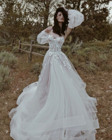 “Love is a canvas furnished by nature, and embroidered by the imagination.” ~ Voltaire “PASTORA” gown from our WILDBLOOM Collection 🌸 She’s a romantic guipure lace bustier ball gown with layers of tulle and organza and waterfalls of delicate hand appliqués. Customize “Pastora” in unlimited ways, and pair with accessories like detachable sleeves. Now available for fittings at our LA Flagship and a upcoming trunk shows! Call/text 310.595.1101 to book or with any questions! #PASTORAgown... Gowns With Trains, Lauren Elaine Bridal, Bohemian Wedding Dress Lace, Custom Wedding Dresses, Detachable Sleeves, Couture Bridal, Lace Bustier, Custom Wedding Dress, Bridal Fashion Week