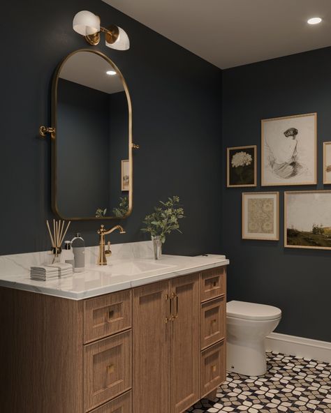 Who loves a moody powder room - we do!! 👋🏻👋🏻 - - - - - - - #interiordesign #interiordesigner #homedecor #homedesign #interiorinspo #interiordecorating #interiorstyling #interiordetails Moody Spare Bathroom, Black And Gold Finishes In Bathroom, Moody Full Bathroom, Painted Half Bath, Small Bathroom Black Walls, Midcentury Powder Room Ideas, Navy Cabinet Bathroom, Moody Teal Bathroom, Light Moody Bathroom