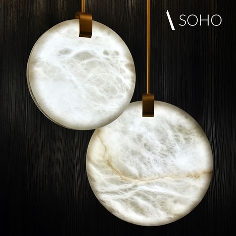 Two alabaster discs and a metallic ring and rope, SOHO design resides in the simplicity and strength of materials. The clash of these opposing substances and all the little details of this pendant light brings an elegant touch, making of SOHO an iconic light fixture!

#atelieralainellouz #aae #alabaster #lighting #lightingdesign #soho #stonedesign #frenchdesign #luxurylightingdesign #contemporarydesign #alabasterlighting Alabaster Lighting, Strength Of Materials, Alabaster Light, Luxury Lighting Design, Metal Interior, Side Lamps, Pure Design, The Clash, The Union