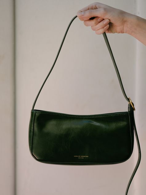 Meet a petite, on-the-go edition of our best-loved baguette bag. An easy-to-carry little number at a perfectly accessible price point. Fabric: Vegan Leather Zip at top Lined Shoulder bag with golden-tone hardware Crescent Shoulder Bag, Baguette Purse, Black Everyday Baguette Shoulder Bag, Small Shoulder Purse, Everyday Green Shoulder Baguette Bag, Green Shoulder Bag, Going Out Bag, Black Shoulder Baguette Bag For Shopping, Black Baguette Shoulder Bag