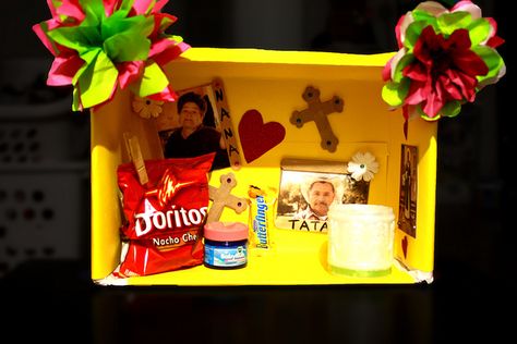 To make your own Day of the Dead Shoebox Altar you need:    –Shoe-box- any size  –Paper or wrapping paper to cover your box  –Pictures of passed loved ones  –Items loved ones enjoyed- remember anything counts as an offering  –Candles  –Tissue for flowers- optional, but flowers play a big part in the decor of an altar. You can also use fake flowers.  –Adhesive to stick all your goods Shoebox Altar, Diy Day Of The Dead, Dia De Los Muertos Decorations Ideas, Spanish Projects, Mini Altar, Mexican Holiday, Baby Center, Fall Holidays, Family Traditions