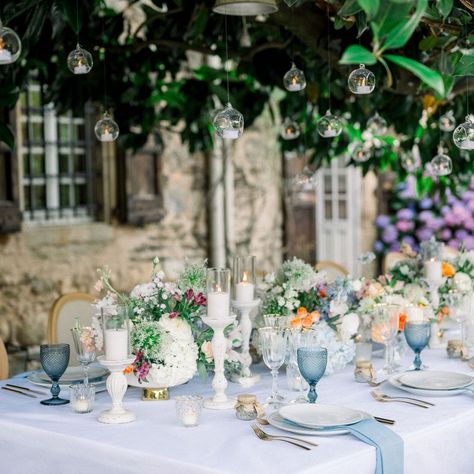 A Touch of Elegance for Your Special Day . Our wedding tablescape is designed to capture the beauty of romance with a perfect balance of soft, inviting hues. The delicate arrangement of flowers in blue, peach, and light orange brings a serene and dreamy atmosphere, setting the tone for an unforgettable celebration. Whether you're planning a chic, modern wedding or a timeless classic affair, these floral accents complement every style with their fresh and elegant charm. The soft blues evoke... Chic Modern Wedding, Arrangement Of Flowers, Dreamy Atmosphere, Wedding Tablescape, Orange Wedding, Blue Peach, Wedding Tablescapes, Light Orange, Modern Wedding