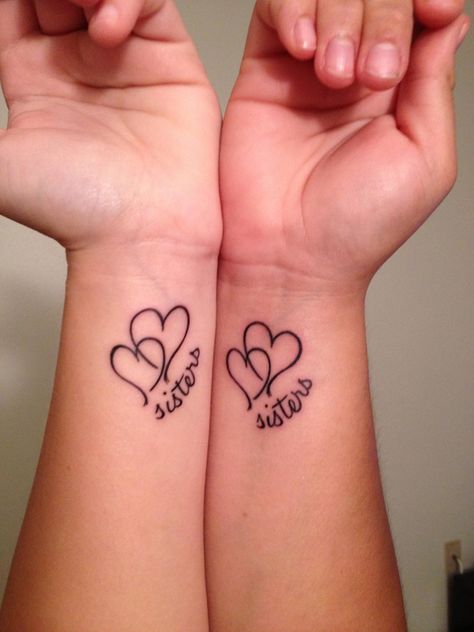 Sister Tattoos Ideas: if only my sis would get a tattoo. Maybe convert it to a friendship tattoo. Sister Heart Tattoos, Unique Sister Tattoos, Cute Sister Tattoos, Small Sister Tattoos, Sister Tattoo Designs, Heart Tattoo Wrist, Sisters Tattoo, Matching Sister Tattoos, Sibling Tattoos