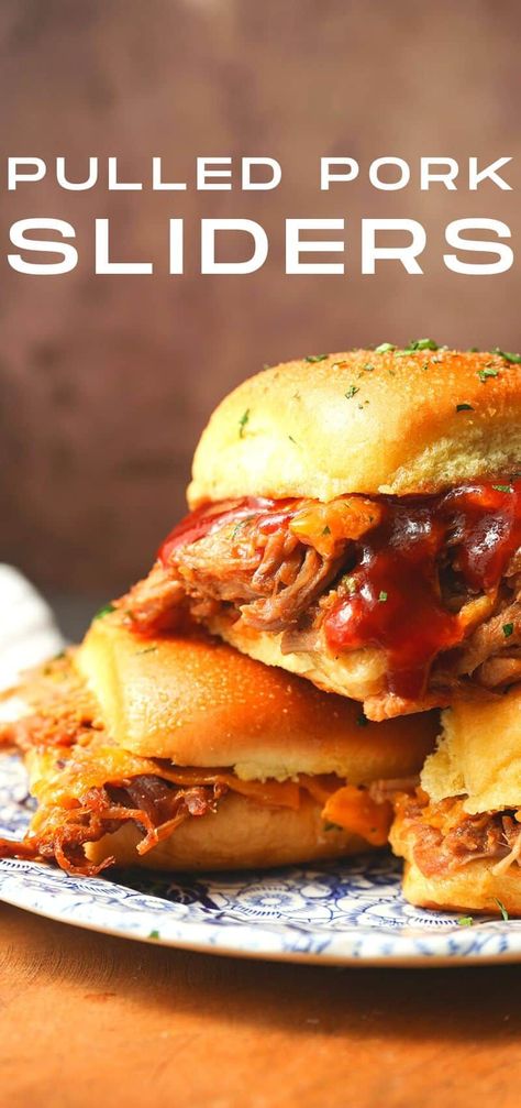 Easy Pulled Pork Sliders: Pillowy rolls filled with delicious, mouth-watering, tender pulled pork, bbq sauce, and cheese are brushed with melted butter, garlic, and herbs, then baked to toasty, melty perfection. They’re like the little black dress of the sandwich world and perfect for every occasion. Bonus: They're done in 30 minutes from start to finish! Pulled Pork Sliders For A Crowd, Barbecue Sliders, Pork Bbq Sauce, Pulled Pork Bbq Sauce, Bbq Pulled Pork Sliders, Pork Sliders Recipes, Easy Slider, Easy Pulled Pork, Pulled Pork Sliders