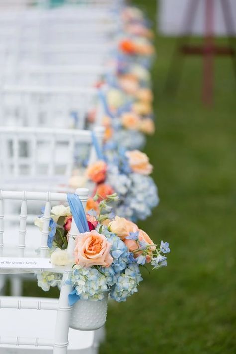 Peach And Blue Wedding Decorations, Dusty Blue And Peach Wedding Decor, Dusty Blue And Orange Wedding Centerpieces, Peach And Blue Centerpieces, Dusty Blue Wedding Ceremony Decor, Dusty Blue And Peach Wedding Cake, Periwinkle And Peach Wedding, Ice Blue And Peach Wedding, Cornflower Blue And Peach Wedding