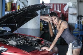 Servicing on a Budget: 6 Tips for Keeping the Car Repair Costs to the Bare Minimum - TechDrive Garage Wallpaper, Woman Mechanic, Girl Mechanics, Auto Garage, American Auto, Mechanic Garage, Car Mechanic, Car Girl, Car Girls