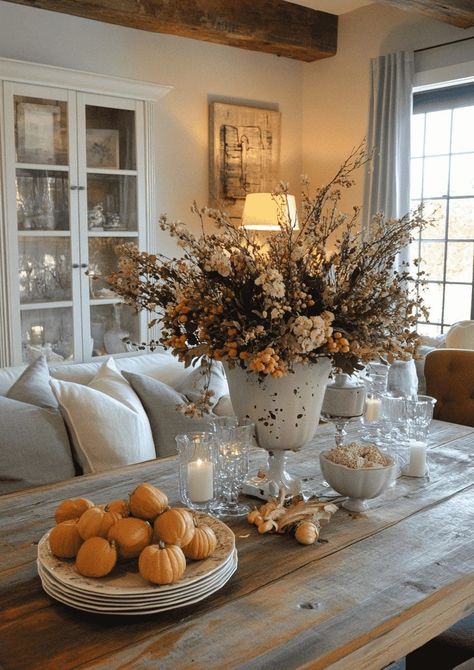 30 Best Fall Centerpiece Ideas for Every Style 106 30 Best Fall Centerpiece Ideas for Every Style Fall Table Vignettes, Fall Decor Vignettes, Fall Island Decor, Fall Buffet Table Decor, Modern Fall Table Decor, Fall Hutch Decor, Coffee Table Fall Decor Ideas, Dusty Autumn, Coffee Table Fall Decor