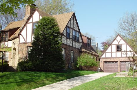 An attached garage was converted into a full dining room, and a new garage built, matching the house's historical Tudor-style masonry and timbering. Tudor Garage Addition, Tudor Addition Exterior, Tudor Garage, Tudor Dining Room, Tudor Addition, Updated Tudor, Tudor Renovation, Garage Additions, Exterior Aesthetic