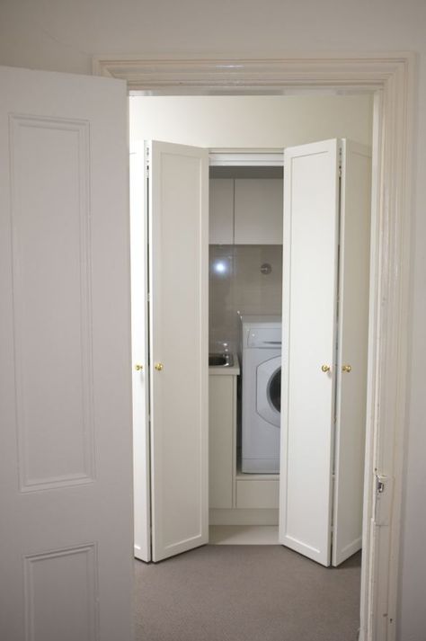 Bifold doors conceal a cupboard laundry Laundry Cupboard Doors, Laundry With Bifold Doors, Laundry Bifold Doors, Cupboard Laundry, Laundry Cupboard, Laundry Doors, Best Bath, Cupboard Doors, Bifold Doors