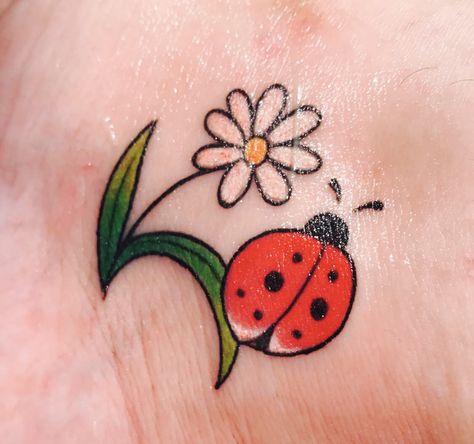 My new ladybug tattoo🐞 on my inner ankle Daisy And Ladybug Tattoo, Ladybug Daisy Tattoo, Flower Tattoo With Ladybug, Cartoon Ladybug Tattoo, Dainty Ladybug Tattoo, Ladybug On Flower Tattoo, Delicate Ladybug Tattoo, Ladybug Tattoo, Little Lady Bug Tattoos