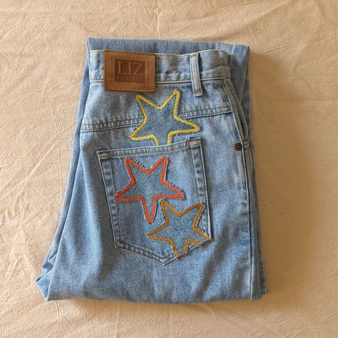 "Reworked vintage light wash mom jeans. These jeans are reworked with handmade star patches in a mainly yellow and orange color pallate.  All pockets are fully functional.  Original jeans are by Liz Wear. 100% cotton, made in Phillipines.  Marked a size 10 Petite- 29\" waist, 11.5\" rise, 39\" hips, 26\" inseam, 14\" leg opening.  In great vintage condition with some very light vintage wear." Patchwork Star, Light Wash Mom Jeans, Star Patches, Reworked Denim, Patchwork Clothes, Diy Jeans, Vintage Mom Jeans, Reworked Vintage, Jean Pockets