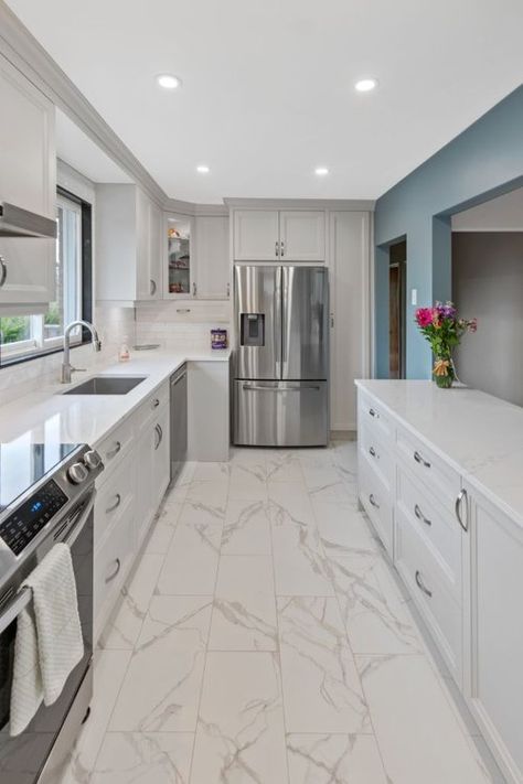 Small Tile Kitchen Floor, Small Gully Kitchen Ideas, Apartment Kitchen Tile Floor, Kitchen Tile For White Cabinets, Small Elegant Kitchen Ideas, Kitchen With White Marble Floors, Small Double Gallery Kitchen Design, Best Kitchen Tile Floors, White Tile Flooring Kitchen