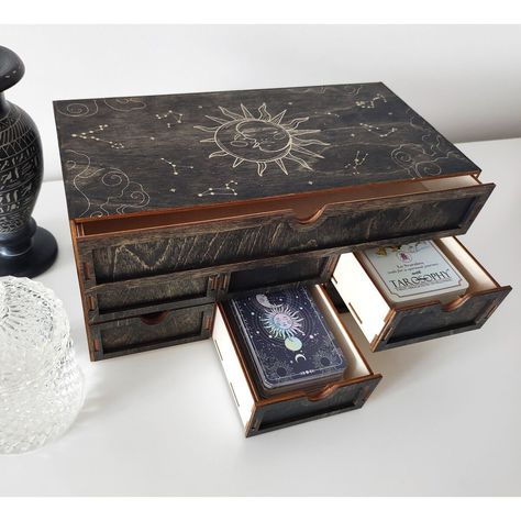 #astrology #jewelryorganizer #oracledecks #moon #tarot #altarbox #crystal #witch #divinationtools #tarotreading #spiritualtools #wicca Tarot Box Ideas, Witchy Storage Ideas, Witchy Gift Basket, Magic Box Ideas, Witch Furniture, Crystal Organization, Aesthetic Storage, Portable Altar, Astrology Moon