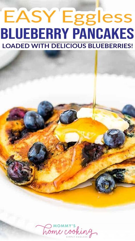 These Eggless Blueberry Pancakes are most definitely not a weekend-only treat! They’re light and fluffy, loaded with delicious blueberries and made from scratch! A guaranteed family favorite. This easy recipe makes eggless pancakes that are light and fluffy and only calls for a few simple ingredients you probably have in your kitchen right now. | @mommyhomecookin #egglessbreakfastrecipes #egglesspancakes #egglessrecipes Eggless Pancakes, Eggless Breakfast, Family Friendly Breakfast, Blueberry Pancakes Recipe, Blueberry Pancake, Eggless Recipes, Recipes With Few Ingredients, Blueberry Pancakes, Savory Breakfast