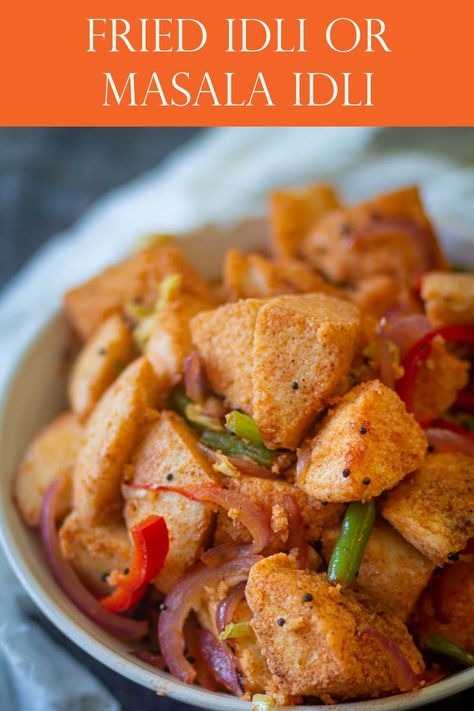 Fried Idli or Masala Idli is a yummy breakfast dish made with leftover Idlis. This is a mildly spiced dish made by sauteing vegetables and idlis in a pan. #friedidli #masalaidli #idlirecipe #friedidlirecipeeasy #friedidlistreetfood #friedidlibreakfast Vegetarian Food List, Masala Idli, Pav Bhaji Masala, Fried Breakfast, Idli Recipe, Savory Rice, Tastemade Recipes, Vegan Side Dishes, Sauteed Vegetables