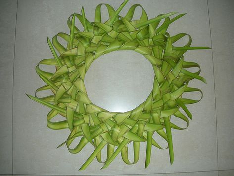 puni- wreath | Puni wreath with loops around the edges. | homemaker62 | Flickr Palm Sunday Crafts, Palm Frond Art, Tropical Flower Arrangements, Coconut Leaves, Wreath Wall Decor, Family Reunion Planning, Leaf Crafts, Palm Sunday, Wreath Wall