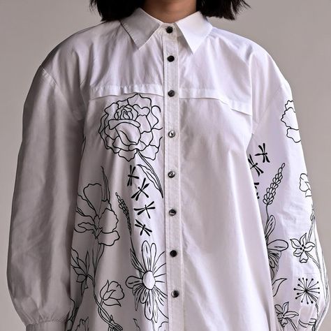 Efflorescence of Elegance 🌸 Weave your fashion story with our #BlossomWhiteShirt. It's more than a shirt; it's the art of life's whispers… | Instagram White Embroidered Casual Shirt, White Casual Shirt With Embroidered Graphics, Traditional White Shirt With Floral Embroidery, Spring White Embroidered Shirt, Traditional White Embroidered Shirt, Fabric Paint Diy, Bead Embroidery Tutorial, Elegant Blouses, Painted Clothes