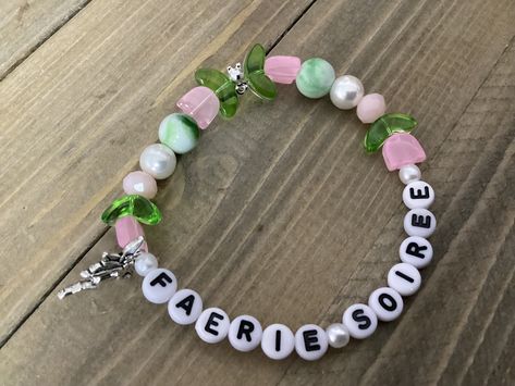 Melanie Martinez bracelet titled " Faeri Soirée" Melanie Martinez Kandi, Trilogy Tour Bracelets, Melanie Martinez Bracelet Clay Beads, Bracelet Ideas Melanie Martinez, Melanie Martinez Kandi Bracelet, Melanie Martinez Themed Bracelets, Melanie Martinez Inspired Bracelet, Melanie Martinez Bracelet Idea, Slytherin Accessories