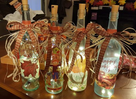 Unique Wine Bottle Crafts, Thanksgiving Wine Bottle Crafts Diy, Fall Wine Bottle Decor, Fall Wine Bottle Crafts, Fall Wine Bottle Crafts Diy, Thanksgiving Wine Bottle Decorations, Fall Painted Wine Bottles, Wine Bottle Fall Decor Diy Projects, Holiday Wine Bottle Crafts