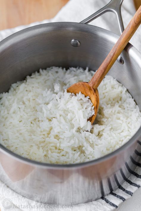 Learn how to cook rice perfectly every time. This is our go-to method to make fluffy white rice and it doesn't get any easier. No more gummy or hard rice! To cook rice on the stove, all you need is a medium saucepan with a tight-fitting lid. Freezing Cooked Rice, White Rice Recipes, Rice On The Stove, Creamy Chicken And Rice, Sweet And Spicy Chicken, Seared Chicken Breast, Cooking Jasmine Rice, Cook Rice, Easy Chicken Breast