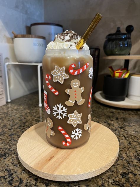 Enjoy your favorite iced coffee in the cutest Christmas treats themed cup! Makes the perfect gift as well 🎄  All my items are made with love and handled with care <3 Comes with a plastic clear straw.  Option for a glass straw is in the drop down  Design is made with permanent, high-quality vinyl. Care instruction card included in package. Care Instructions:  Hand wash with light soap and cool water only.  Do not scrub. Do not soak. NOT microwave or dishwasher safe. Avoid exposure to extreme hea Christmas Iced Coffee Starbucks, Coffee Glass Cup Design Christmas, Christmas Glass Cups, Cup Ideas, Cricut Cup Ideas Vinyls, Bamboo Cups, Christmas Cups, Cricut Christmas Ideas, Christmas Props