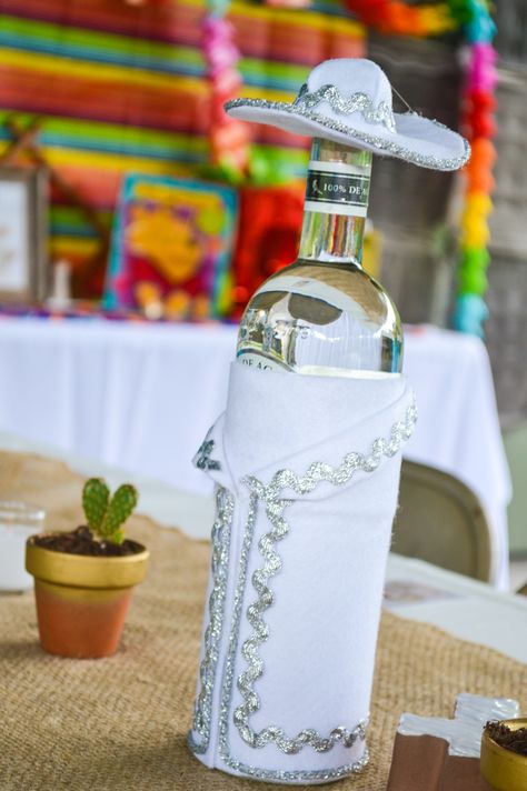 Fiesta decor.  Charro dressed tequila bottles Mexican Theme Quinceanera, Charro Theme Party, Quince Decorations Ideas, Theme Quinceanera, Charro Wedding, Charro Theme, Mexican Theme Wedding, Fiesta Decor, Mexican Quinceanera