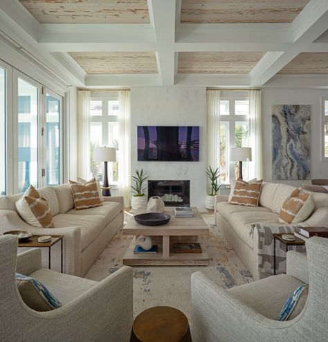 Living room A marble fireplace accentuates the high coffered ceilings with Pecky Cypress wood inlays #Livingroom #marblefireplace #cofferedceilings #PeckyCypress #woodinlays Living Rooms With Tv, Living Room Decor Coastal, Room Decor Coastal, Coastal Living Room Decor, Best Benjamin Moore Paint Colors, Painting Bathroom Cabinets, Pecky Cypress, Living Room Paint Color Ideas, Benjamin Moore Paint Colors