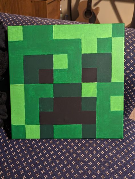 Creeper 10x10 acrylic painting on canvas for Minecraft themed room. Follow the link to see how I did it! Minecraft Creeper Painting, Minecraft Art Painting, 10x10 Canvas Painting, Minecraft Canvas Painting, Minecraft Creeper Art, Creeper Painting, Creeper Wall, Minecraft Painting, Painting Minecraft