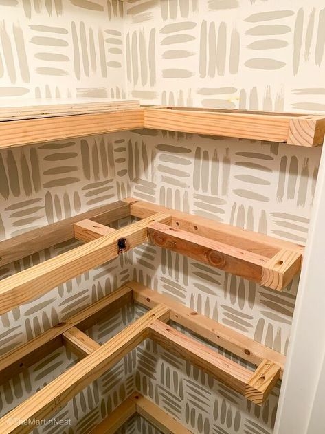 Have a spare closet that isn’t living it’s best life? Or maybe it’s just not serving you in the best way? You can turn it into a functional pantry with these DIY floating corner pantry shelves. Who says a pantry can’t be beautiful too? When we moved in this hall closet had the same standard wire shelving that you’ll find in most closets. Durable, but not always the most functional or pretty. Things would get lost in the depth of the shelving, and fall over on the wires. I am f… Wrap Around Pantry Shelves, U Shaped Shelves In Pantry, Small Pantry Wood Shelving Ideas, Replacing Pantry Shelves, Coat Closet To Pantry Conversion, Heavy Duty Pantry Shelves, Pantry L Shaped Shelves, L Shaped Pantry Shelves, Turn Closet Into Bookshelves