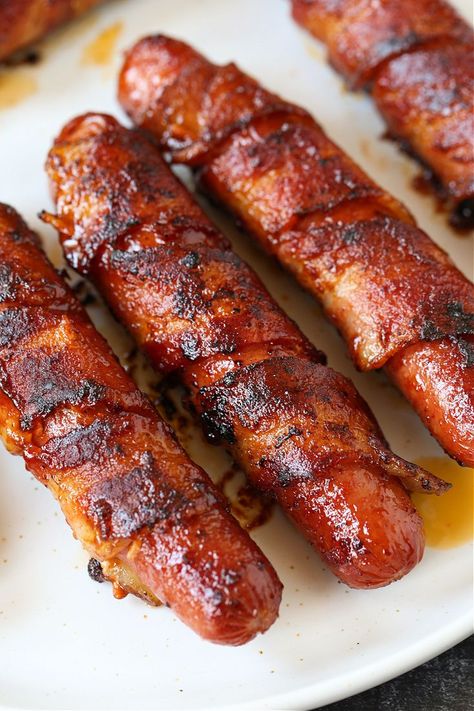 These Bacon Wrapped Hot Dogs are the ultimate hot dog recipe! Super crispy bacon with a snap from the hot dog, coated with a sweet and spicy glaze! Hotdogs With Bacon, Hot Dog Marinade Recipes, Bacon Wrapped Hot Dogs Grilled, Bacon Hotdogs Recipes, Jumbo Hot Dogs, Hot Dogs With Bacon, Hot Dog Wrapped In Bacon, Bacon Wrapped Hot Dogs Air Fryer, Hot Dog No Bun