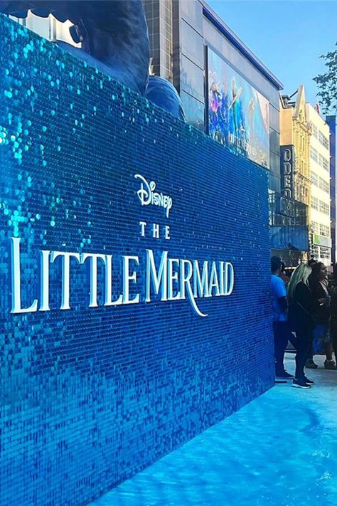 shimmer wall, movie premiere event Backdrop Design Event, Mermaid Stage Decoration, Iridescent Shimmer Wall, Under The Sea Prom Photo Booth, Gala Event Decor, Brand Installation, Little Mermaid Stage Sets, Backdrop Mermaid Theme, Little Mermaid Premiere