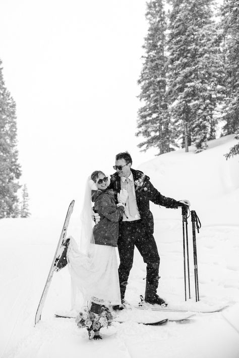 Black and white photo. Bride and groom on skis. Snow falls on the ski trail and pine trees covered in snow! Skiing Wedding Photos, Aspen Winter Wedding, Killington Vermont Skiing, Winter Ski Wedding, Ski Lodge Wedding Winter, Snowboard Elopement, Ski Wedding Ideas, December Elopement, Ski Engagement