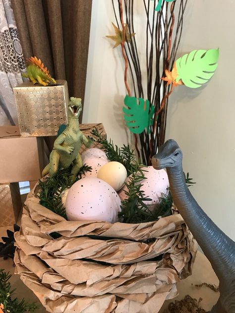 Dinosaur nest decor Dinosaur Egg Decor, Dinosaur Themed Decorations, Dinosaur Decorating Ideas, Dino Theme Party Decor, Dinasour Decorations, Jurassic Park Classroom Door, Jurassic Park Decoration, Dinosaur Halloween Decorations, Vbs Dinosaur Theme