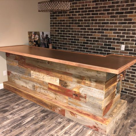 Used reclaimed skip planed barn siding to accent this bar with a custom copper top. Copper Top Bar, Wine Credenza, Copper Bar Top, Dry Bar Ideas, Barn Beam Mantels, Barn Bar, Home Bar Plans, Bar Plans, Barn Siding