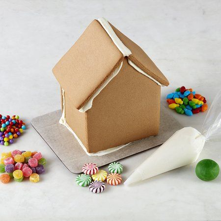 Gingerbread House Icing, Gingerbread House Kit, Homemade Gingerbread House, Gingerbread House Decorating, Ginger Bread House Diy, Cool Gingerbread Houses, Gingerbread House Recipe, Gingerbread House Parties, Make A Gingerbread House