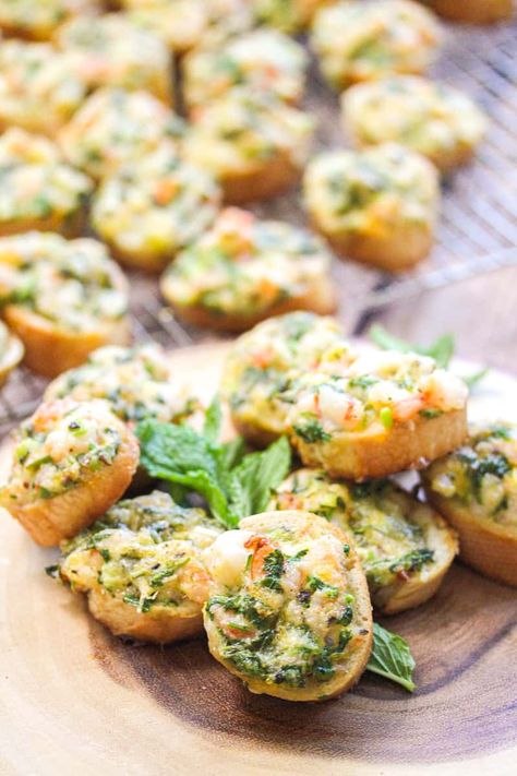 These cheesy, crispy Vietnamese shrimp toasts are great for an easy appetizer that feeds a crowd. They're a favorite at Vietnamese parties. #Recipe #VietnameseFood Vietnamese Appetizers Easy, Vietnamese Appetizers, Vietnamese Shrimp Toast, Vietnamese Shrimp, Pork Spring Rolls, Shrimp Toast, Shrimp Appetizers, Classic Appetizers, Party Finger Foods