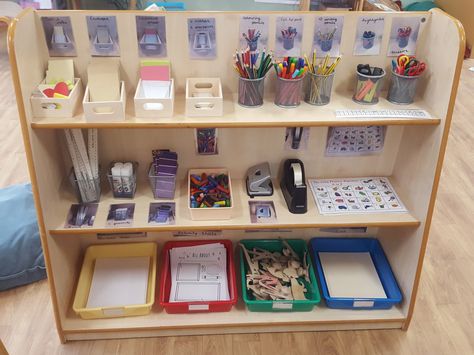 Writing area shelves in our classroom. Children can use anything on the shelves to make anything they wish. Reception Mark Making Area, Writing Area Eyfs Mark Making, Preschool Mark Making Area, Reggio Inspired Writing Area, Writing Area Ideas Eyfs, Outside Writing Area Eyfs, Mark Making Areas Early Years, Nursery Writing Area, Writing Area Reception