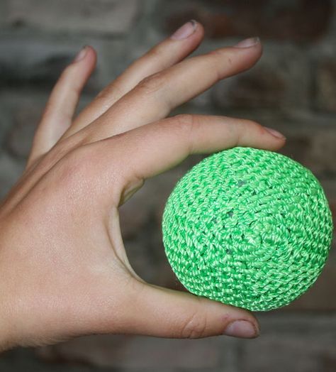 Crocheted Hackeysack/Juggling Ball Good photos to go with the instructions. Also directions for similar balls from a yarn company can be found at www.redheart.com/files/patterns/pdf/LC3055.pdf. Crochet Holder, Crochet Balls, How To Juggle, In The Airport, Crocheted Patterns, Crochet Ball, Crochet Weaves, I Lose, Make Do