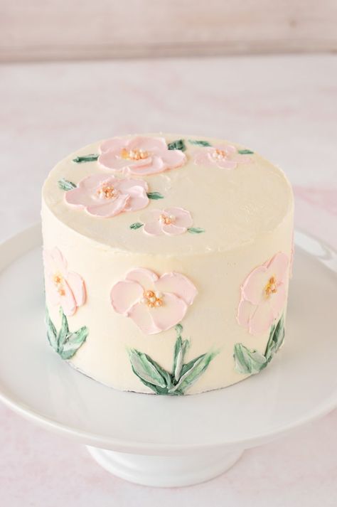 This easy tutorial shows you how to hand paint beautiful floral art onto a cake using buttercream frosting, palette knives, and paint brushes! This simple cake decorating technique is perfect for your next birthday party or wedding, bridal, or baby shower! #cakedecorating #cake #frosting #paintedcake #floralcake #flowercake Floral Bento Cake Design, Petite Cake Design, Decorated Cakes Simple, Cute Spring Cakes, Minimal Floral Cake, Everyday Cake Decorating Ideas, Simple Floral Birthday Cake, Spring Cake Ideas Easy, Pretty Cakes Easy